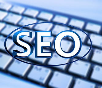 SEO in white Text across a keyboard