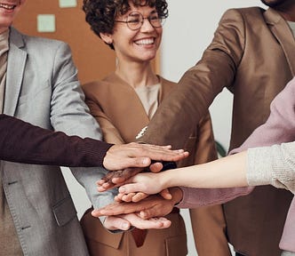 Photo Of People Holding Each Other’s hands