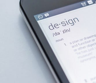 Smart phone screen showing the definition of the word design