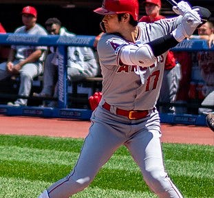 Shohei Ohtani at bat, wearing Angels’ away gray uniform.