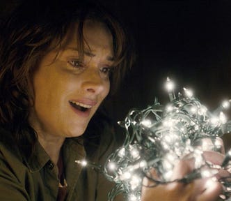 winona ryder holding fairy lights on stranger things netflix show
