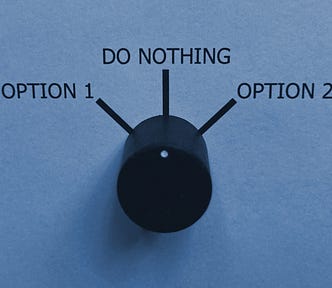 A control panel with a three-position knob to represent decision-making: option 1, do nothing and option 2. The knob is in the middle position (do nothing).