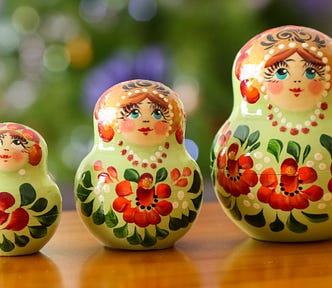 Russian dolls signifying dependency between npm packages