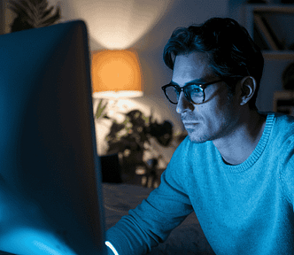Man on a laptop at night — My AI workflow is breaking profit records again