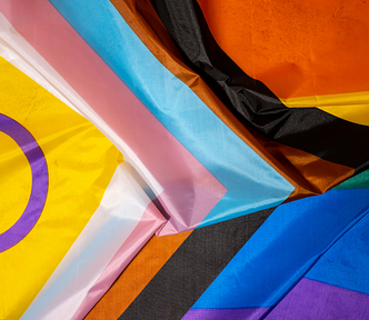 Rainbow LGBTQIA flag made from silk material. Happy pride month. Symbol of LGBTQ pride month.