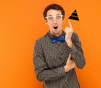 Surprised man with a small pyramid and organge background