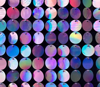 decorative: strings of colored disks organized in an array