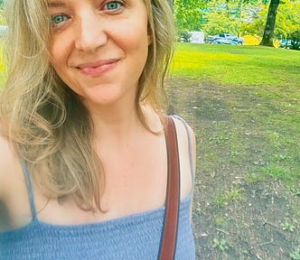 author ouside purple dress