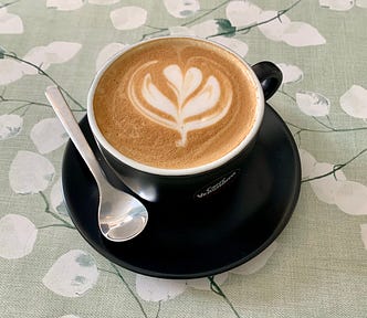 Latte with clover foam