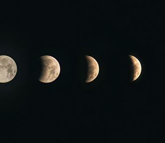 Five images, in a horizontal line, of different phases of the moon, from full to waxing gibbous, to first quarter, to crescent, to a sliver before new.