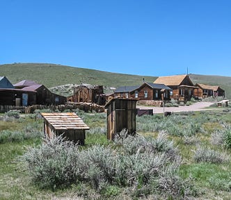 Sage brush and buildings in Bodie State Historical Park, 2006.