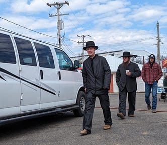 Amish man walking.