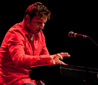 Gentry Bronson performing on a Yamaha electric piano at the Mystic Theater on December 2, 2011