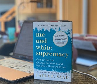 Photo of book “me and white supremacy: Combat Racism, Change the World, and Become a Good Ancestor.”