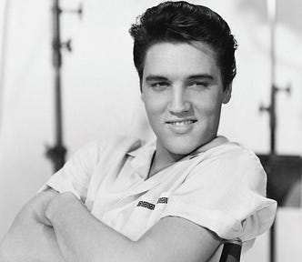 Elvis, leaning back, young and smiling