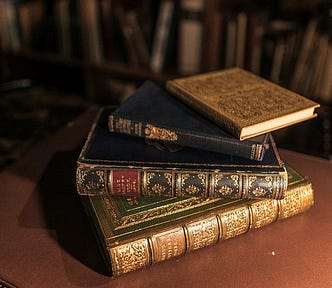 Picture is of a stack of books.