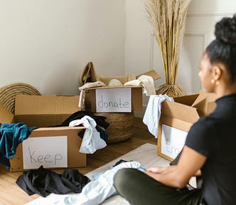 Woman trying to organize her possessions