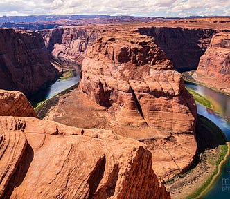 A sweeping landscape image of Horseshoe Bend, known as the “east rim of the Grand Canyon”