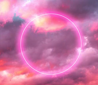 Futuristic neon circle in the burning sky with stunning pink colors.