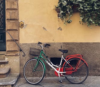 Photo of a bike painted in the Italian flag's colours: green, white and red