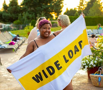 Plus size woman at a pool party