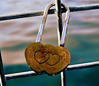 photo of a padlock in the shape of interlocking hearts