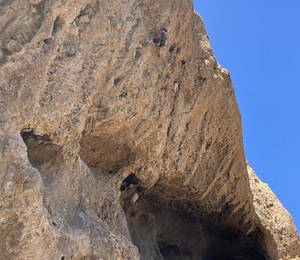 Climber on overhanging rock