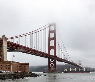 Color photo of the Golden Gate Bridge taken from the San Francisco side
