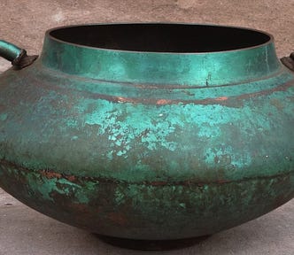 copper vase or bowl with green patina