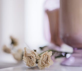 Love is a rose | two dried roses, pink candles, reflections | © pockett dessert