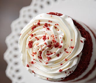 red velvet cake, dessert, close-up of whipped cream and red crumble, on a plate | © pockett dessert, red velvet cake