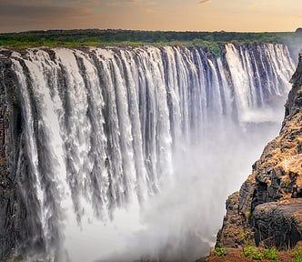 Victoria Falls on the Zambezi River between Zambia and Zimbabwe. Image by Albrecht Fietz from Pixabay.