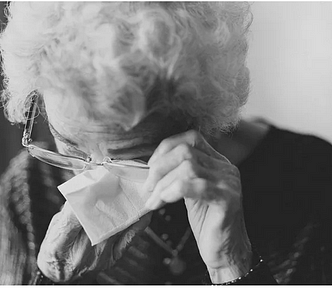 Older woman, crying