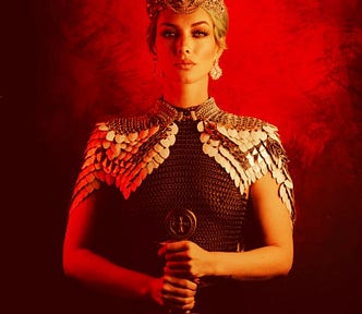 The Countess was indeed a beautiful woman, he thought. Regally dressed in chainmail and mesh and holding a sword.