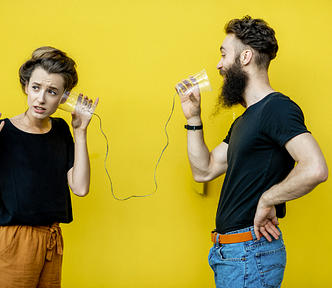 A man and woman communicating effectively through cups with yellow background