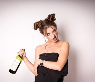 Female with a bottle of wine