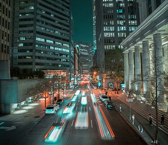 Cars on Road in City during Night Time