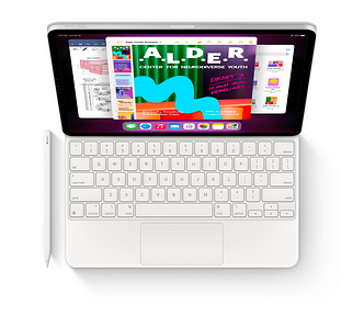 An iPad Pro with a Magic Keyboard and Apple Pencil (Gen 2).