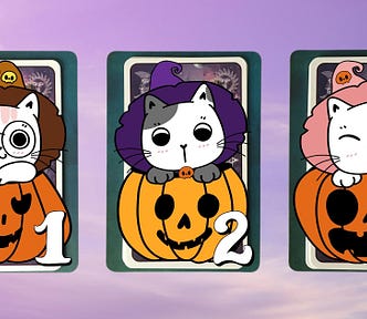 Three tarot and oracle pick a card piles with Halloween cats on them
