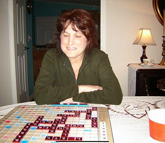 My wife playing Scrabble almost twenty years ago.