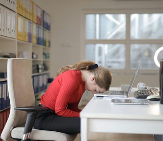 Woman leaning on laptop