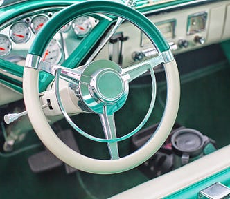 Mint green vintage car. Image by Jill Wellington from Pixabay.