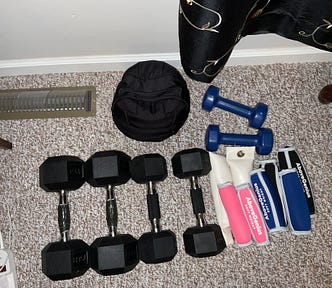 Picture of dumbbells of various weights on my floor