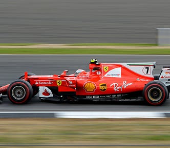 Ferrari Formula 1 car speeding down the racetrack