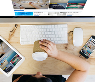 Downward view of woman on a desktop computer — My Zero Fluff Intro Formula Is Working Like Gangbusters On My 4 Websites