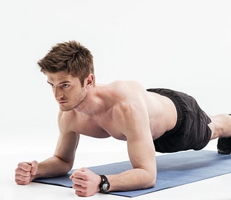 A man doing 2-minute planks every day