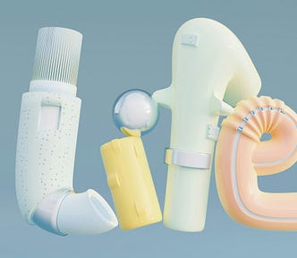 Pastel coloured medical devices and tubing spelling out the word, @life”