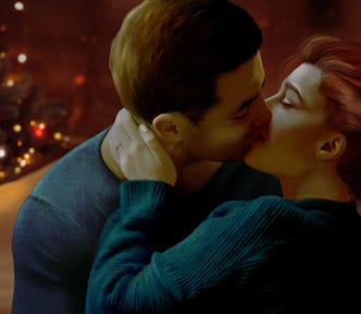 Man and woman kissing romantically on a sofa with a Christmas tree and lights in the background