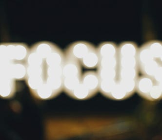 Out of focus neon lights of the word ‘focus’