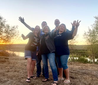 This is a group photo of the fantastic five, our volunteer group for Camp of the Hills in Marble Falls Texas.